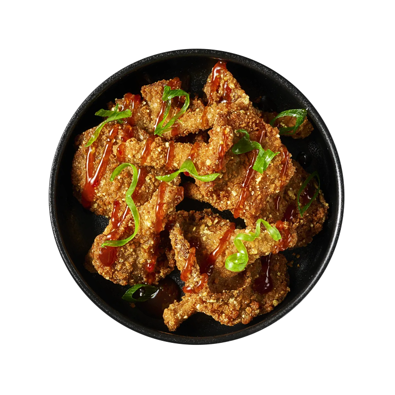 Crispy fried mushrooms in a black bowl